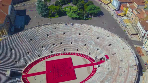 Aerial View Of Arena Di Verona, Italy. The drone moves away from the arena. alt