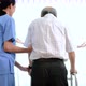 Asian young nurse take care a senior with a walker. - VideoHive Item for Sale