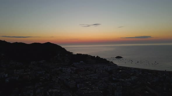 Drone View of the Sunset Over Balearic Sea From the Shores of Tossa De Mar alt