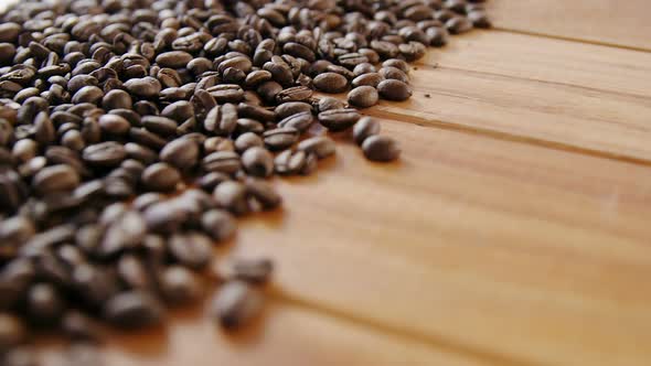 Close-up of scattered coffee beans alt