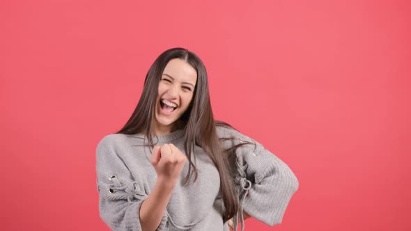 Yes, I Done It. Excited Girl with Joyful Expression, Celebrates Her Success. alt