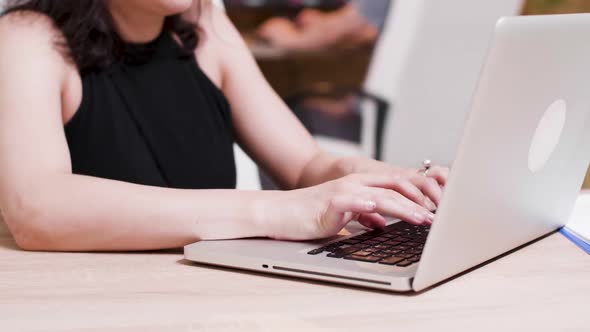 Close Up Typing on Laptop Keyboard alt