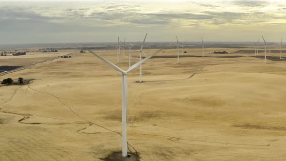 Aerial shot of wind turbines in a field on Montezuma Hills. alt