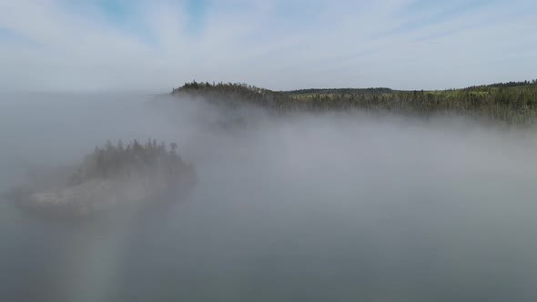 Fog at north shore minnesota, lake superior landscape aerial footage alt