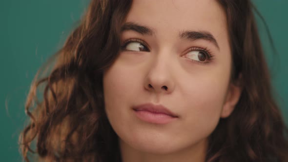 A Close Up Portrait of a Young Beautiful Woman Feel Happy