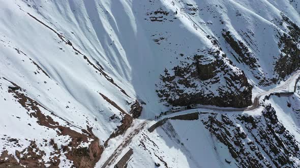 Aerial Shot of Beautiful Snow Covered Mountains  alt