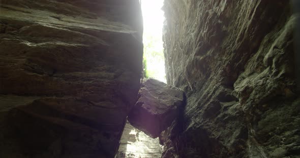 The camera rising up over the hill and waterfall. shot of the small waterfall