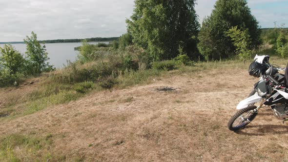 Drone Shot of Men on Motorcycles Chatting and Resting alt