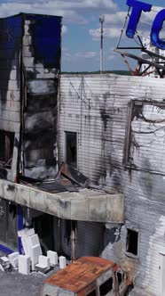 Vertical Video of a Bombed Shopping Center During the War in Bucha Ukraine alt