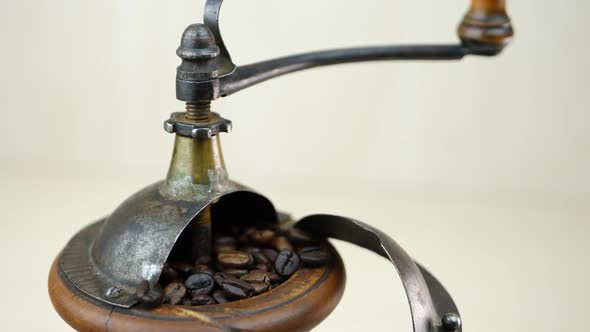 Coffee Beans and Vintage Wooden Grinder
