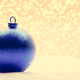Glitter blue Christmas ball on snow - PhotoDune Item for Sale