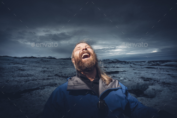 Happy man outdoors in snowy plain - Stock Photo - Images