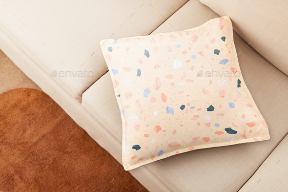 Pastel Terrazzo cushion cover, on beige couch, earth tone furniture