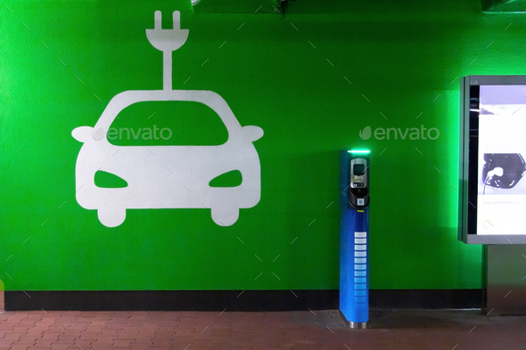 Symbol sign of electric cars charging station. Plug-in charger or socket for PHEV cars or vehicles