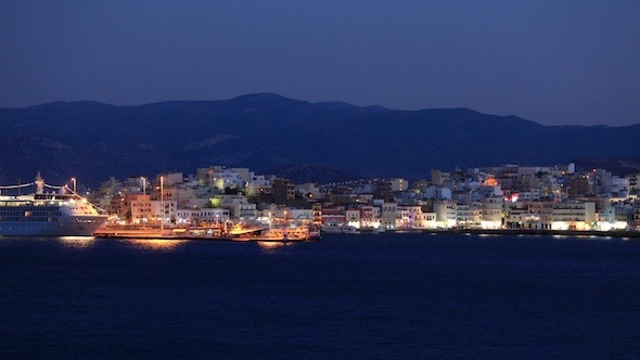 Evening View Of Agios Nikolaos City Across The Bay
