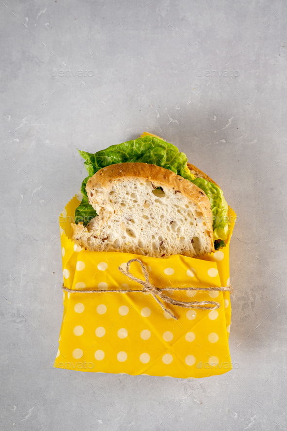Vegan sandwich with sourdough non-gluten bread in beeswax