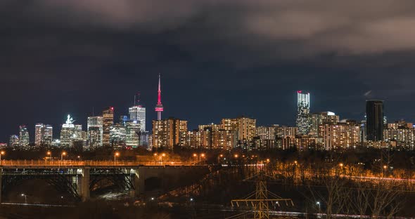 Urban Night City Skyline Toronto Rush Hour Traffic with Clouds