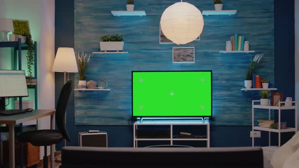 Green Screen Design on Television in Empty Room alt