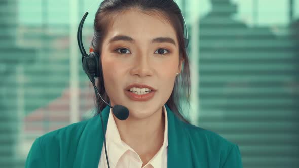 Video Call Camera View of Businesswoman Talks Actively in Videoconference alt