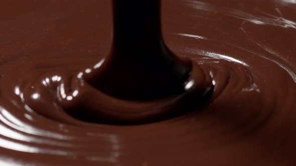 Pouring Melted Liquid Premium Dark or Milk Chocolate with Nuts Preparing Confectionery Dessert alt