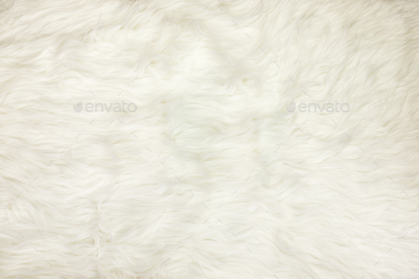 Close up at white fur fabric texture background