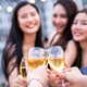 Group of young Asian girls drinking champagne and toasting glass, having party at rooftop restaurant - PhotoDune Item for Sale