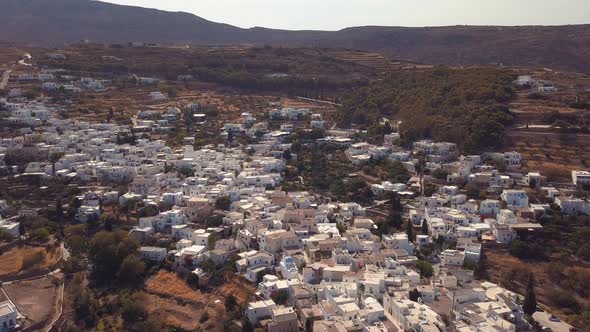 Wide Aerial Drone Shot Revealing the Many Buildings and Houses of the Island Village of Lefkes Greec alt
