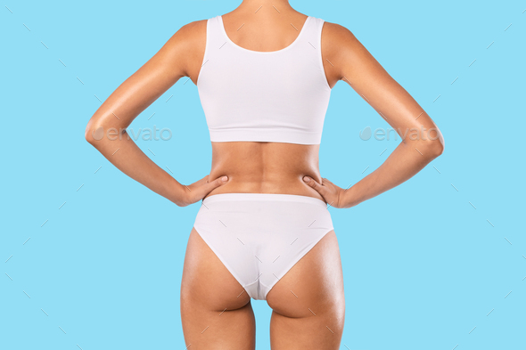 Rear Back View Of Young Slim Woman In White Underwear Stock Photo by  Prostock-studio