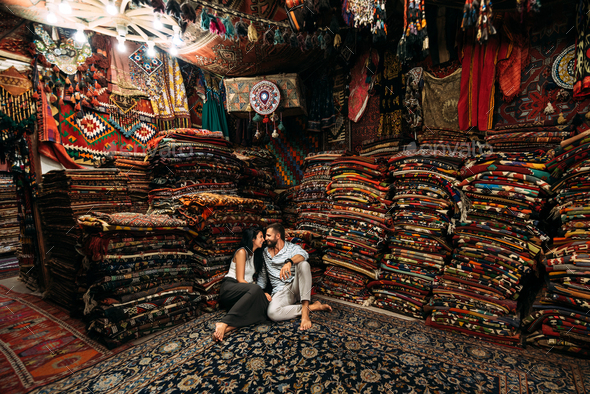 Couple having fun. Couple in love in Turkey. Man and woman in the Eastern country. Gift shop
