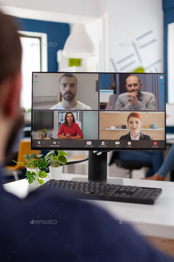 Businessman talking with remote team planning management strategy