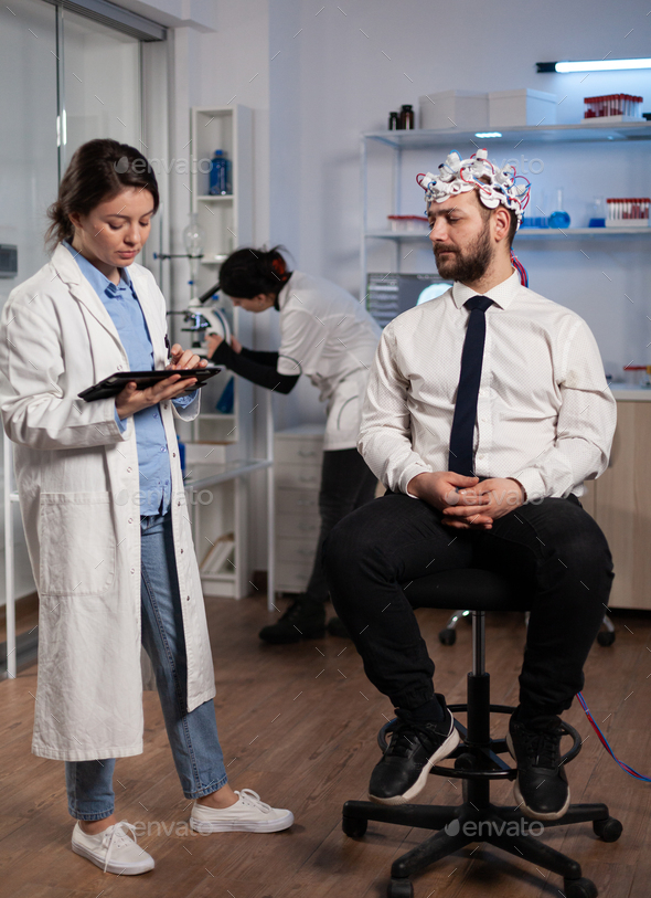 Neurologist woman monitoring brain evolution developing medical treatment