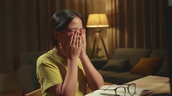 Teenage Girl Stressed While Distance Learning With Computer From Home alt