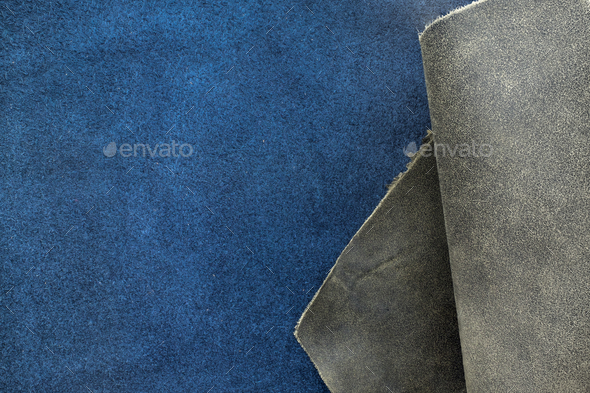 Close up fold grain grey and navy blue leather texture background,fabrics Division