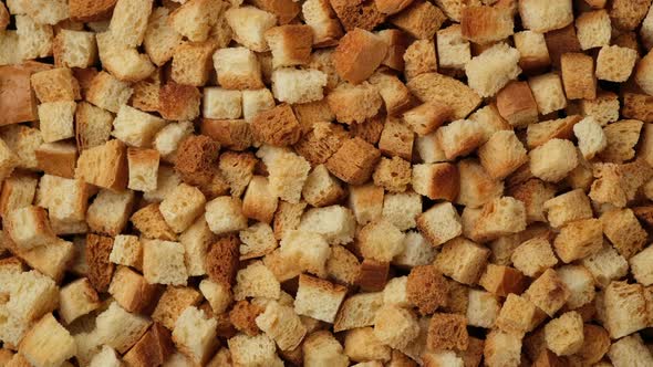 Hard bread crackers top view, rotation. Bread crumbs alt