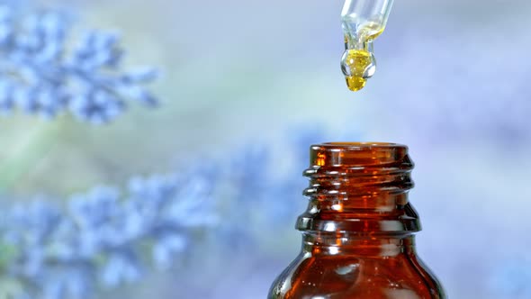 Super Slow Motion Shot of Oily Essence Drop Into Phial at 1000Fps alt