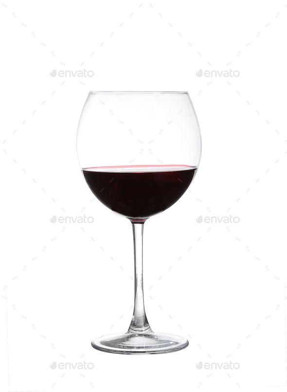 red wine swirling in a goblet wine glass, isolated on a white