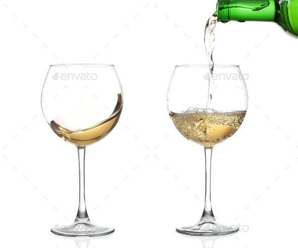 WHITE wine swirling in a goblet wine glass, isolated on a white background