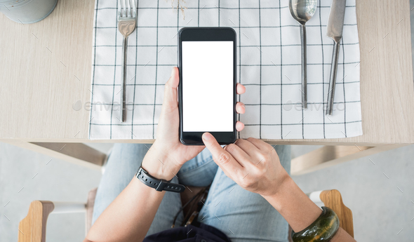 top view people use mobile order menu at restaurant