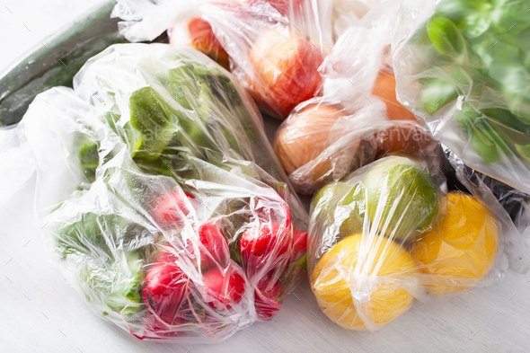 single use plastic waste issue. fruits and vegetables in plastic bags ...