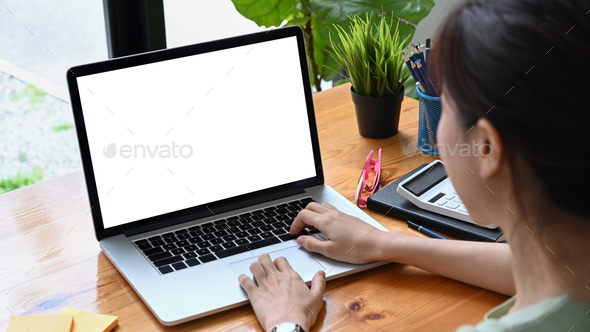 Female accountant working with computer laptop. - Stock Photo - Images