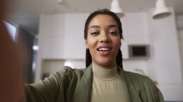 Screen Headshot of Smiling African American Woman Wave Greet Talk Speak on Video Call alt