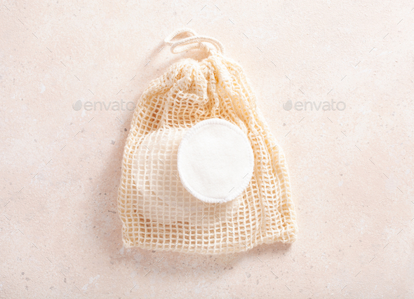 zero waste eco friendly hygiene bathroom concept. reusable cotton pads in bag