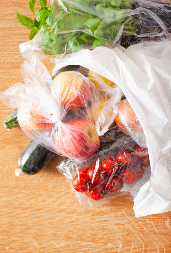 single use plastic waste issue. fruits and vegetables in plastic bags