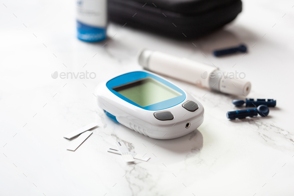 glucometer ketometer lancet and strips for self-monitoring of blood glucose or ketones level.