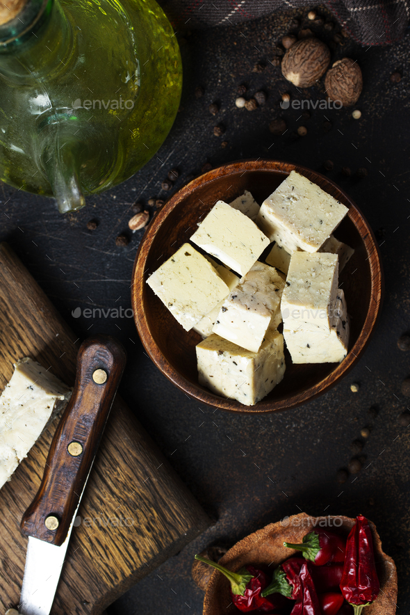 Fresh tofu on board, an alternative to meat protein. Vegetarian cuisine. Stock Photo by tycoon101