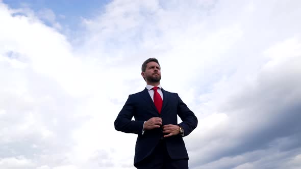 Manager Executive Man in Businesslike Suit on Sky Background Male Formal Fashion