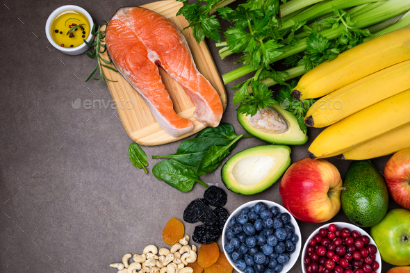 Healthy food for heart. Fresh fish, vegetables, fruits, berries and nuts