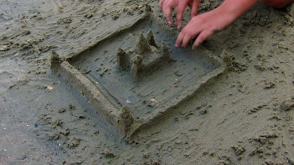 Building Sand Castle on Beach Time Lapse