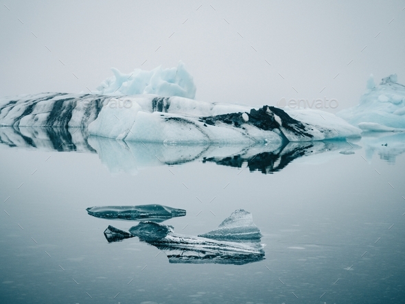 Ice on water between snow Stock Photo by ADDICTIVE_STOCK | PhotoDune