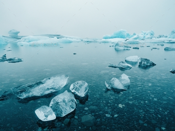 Ice and snow on water Stock Photo by ADDICTIVE_STOCK | PhotoDune